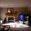 (BEFORE) These homeowners called us about designing and building a custom wall unit/bookcase. They wanted to surround a new Flat Screen TV and have storage for media equipment CD's, DVD's and games for the kids. A new Custom Fireplace Mantel was also added.                                         